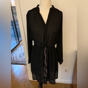 Simple black dress by Xhileration. Size small. Fun tie at waist.